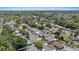 Neighborhood aerial view with lush trees and well-maintained homes at 4607 Kennedy Dr, New Port Richey, FL 34652