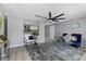 Open living room design with sight lines into the kitchen at 4607 Kennedy Dr, New Port Richey, FL 34652