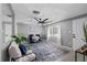 Well-lit living room with modern decor and comfortable seating area at 4607 Kennedy Dr, New Port Richey, FL 34652