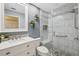 Beautiful bathroom featuring a glass enclosed shower with a built in bench at 4856 Alamo Ct # 4856, New Port Richey, FL 34655