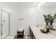 Bright bathroom featuring a sleek vanity with modern countertop, glass shower, and contemporary decor at 5383 Companion Ln, Tampa, FL 33619