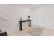 Welcoming home foyer showcasing ceramic tile flooring and a decorative console table at 5383 Companion Ln, Tampa, FL 33619