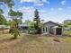Wide backyard view features a shed and enclosed pool at 5411 Joyner Ave, Spring Hill, FL 34608