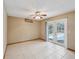 Bedroom featuring tiled floors and pool view through french doors at 5411 Joyner Ave, Spring Hill, FL 34608