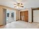 Bedroom featuring tiled floors, French doors to a pool area, and closet at 5411 Joyner Ave, Spring Hill, FL 34608