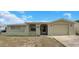 Charming single-story home with a well-maintained front yard and attached one car garage at 6206 11Th Ave, New Port Richey, FL 34653