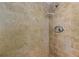 Close-up of tiled shower with corner shelf at 6206 11Th Ave, New Port Richey, FL 34653