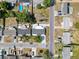 Bird's eye view of a home nestled in a suburban neighborhood with street access at 6431 Gainsboro Dr, Port Richey, FL 34668