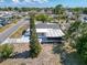 Aerial view of a single story home with a spacious backyard and tree at 6431 Gainsboro Dr, Port Richey, FL 34668