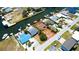Aerial view of waterfront home located on a canal with a dock at 6432 Boatyard Dr, Hudson, FL 34667
