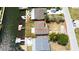 Aerial view of waterfront property featuring backyard with direct access to canal and mature landscaping at 6432 Boatyard Dr, Hudson, FL 34667