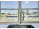 Kitchen sink with a goose neck faucet and a double window overlooking the canal at 6432 Boatyard Dr, Hudson, FL 34667