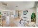 Bright living room area with an open floor plan and clear view into the kitchen at 6432 Boatyard Dr, Hudson, FL 34667