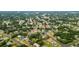 Sprawling neighborhood showcasing beautiful single-Gathering homes and lush green landscaping from a high vantage point at 7365 Pinehurst Dr, Spring Hill, FL 34606