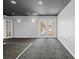 Finished basement with walkout access to a screened in patio at 7466 Jonquil Pl, Weeki Wachee, FL 34607