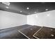 Finished basement with dark ceiling and multiple recessed lights at 7466 Jonquil Pl, Weeki Wachee, FL 34607
