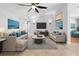 Bright and inviting living room featuring stylish furniture, modern decor, and a neutral color palette at 7466 Jonquil Pl, Weeki Wachee, FL 34607