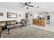 Inviting living area with a breakfast bar and adjacent kitchen create an open and sociable space at 7466 Jonquil Pl, Weeki Wachee, FL 34607