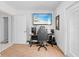 Bright office space with a view and equipped with a modern gaming setup at 7466 Jonquil Pl, Weeki Wachee, FL 34607