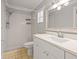 Bathroom featuring a stand-up shower, a mirror, and a vanity with a sink and storage space at 8240 Gulf Way, Hudson, FL 34667
