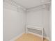Walk-in closet with shelving, tile flooring, and a built in desk at 8240 Gulf Way, Hudson, FL 34667
