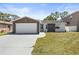 Charming single-story home with a two-car garage and unique stone accents at 8240 Gulf Way, Hudson, FL 34667
