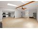Bright, open-concept living area flowing into a modern, updated kitchen at 8240 Gulf Way, Hudson, FL 34667