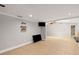 Spacious living area with modern fixtures and tile flooring at 8240 Gulf Way, Hudson, FL 34667