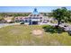 Beautiful community center with manicured lawns and inviting entrance, showcasing community amenities at 8523 Regal Ln, Hudson, FL 34667
