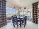 Bright dining area featuring an outdoor view, perfect for entertaining and enjoying meals at 8523 Regal Ln, Hudson, FL 34667