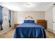 Bedroom featuring carpet floors and side tables at 9811 Hidden Ln # 2, Port Richey, FL 34668