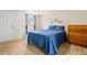 Bedroom with carpet floors and mid-century dresser at 9811 Hidden Ln # 2, Port Richey, FL 34668
