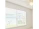 Bright bedroom with a large window, ceiling fan, and white walls at 1013 Sweet Jasmine Dr, Trinity, FL 34655