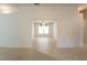 Bright living area features tile flooring, ample natural light, and an open layout, ready for personalization at 1013 Sweet Jasmine Dr, Trinity, FL 34655
