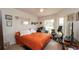 Comfortable bedroom featuring cozy bedding, lots of light, and a ceiling fan at 1034 Aladdin Rd, Spring Hill, FL 34609