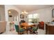 Elegant dining room with a chandelier and a circular table with chairs at 1034 Aladdin Rd, Spring Hill, FL 34609