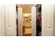 Hallway offers views into both the bathroom and closet at 1034 Aladdin Rd, Spring Hill, FL 34609