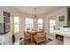 Eat in kitchen area, featuring lots of light and view of pool at 1034 Aladdin Rd, Spring Hill, FL 34609