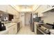 Modern kitchen featuring stainless steel appliances, white cabinets and a double sink at 1034 Aladdin Rd, Spring Hill, FL 34609
