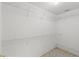 Walk-in closet with overhead metal shelving, offering ample storage space at 10540 Noddy Tern Rd, Weeki Wachee, FL 34613
