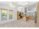 Bright kitchen with stainless steel appliances, granite countertops, kitchen island and eat in nook at 10540 Noddy Tern Rd, Weeki Wachee, FL 34613
