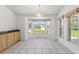 Kitchen nook with bay window and granite countertop. Large windows with beautiful natural light at 10540 Noddy Tern Rd, Weeki Wachee, FL 34613