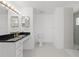 The luxurious bathroom features a shower, toilet, and vanity with gold fixtures at 10540 Noddy Tern Rd, Weeki Wachee, FL 34613