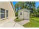 Detached shed in the backyard, providing extra storage and convenience at 10540 Noddy Tern Rd, Weeki Wachee, FL 34613