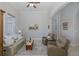Spacious living room with comfortable seating, rug, and art at 10701 Ruffino Ct, Trinity, FL 34655