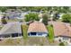 The backyard of this home features a spacious yard and an inviting screened lanai, ideal for outdoor relaxation at 1082 Nodding Shade Dr, Brooksville, FL 34604