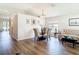 Bright living room features modern flooring, a stylish seating area, and a dining space with a glass table at 1082 Nodding Shade Dr, Brooksville, FL 34604