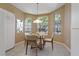 Cozy breakfast nook with bright windows and tiled flooring at 1171 Dartford Dr, Tarpon Springs, FL 34688