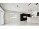 Spacious living area with an open concept floor plan to the kitchen at 11732 Wheatfield Loop, Hudson, FL 34667