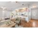 Bright living room boasts an open concept design and breakfast bar, perfect for modern living at 12065 Shadow Ridge Blvd, Hudson, FL 34669